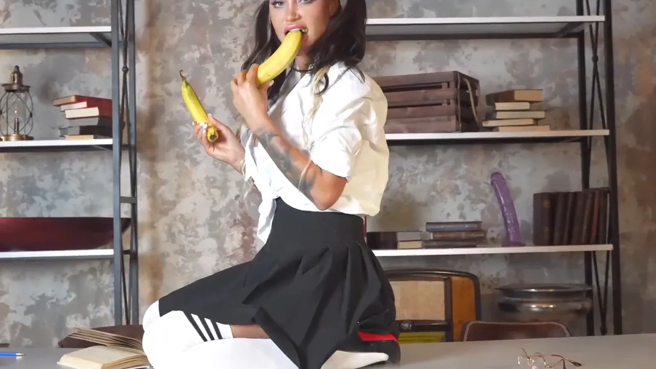Brunette student masturbates with banana, causes squirting orgasms and anal prolapse