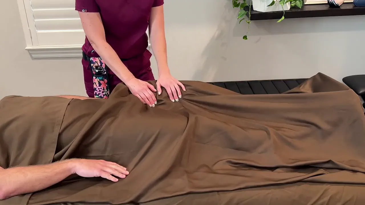 MILF masseuse gives happy ending hand job and cums twice, showing off her big tits