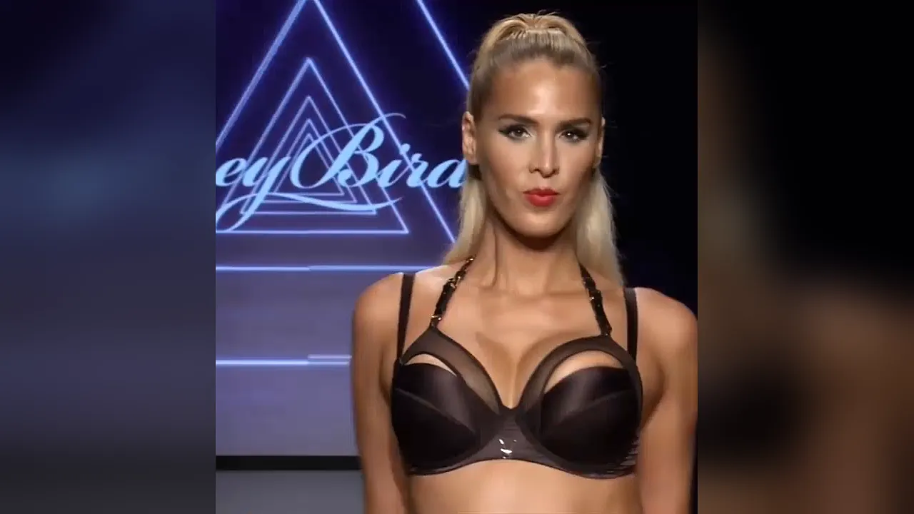 Model strips down to show off her sexy ass in thong