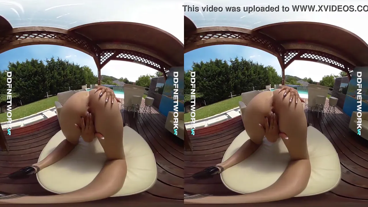 Blonde MILF Mira Sunset strips poolside in VR video