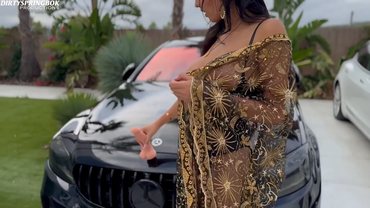 Arab babe in lingerie masturbates with a dildo on her car