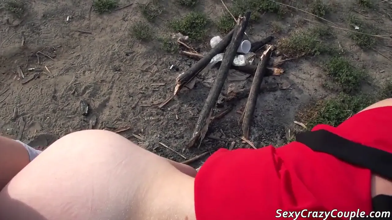 Nude woman inserts large plug into her pussy then goes swimming