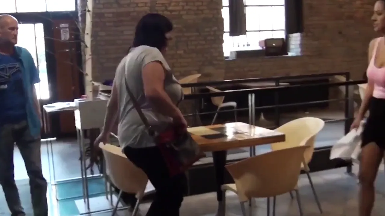Blonde couple has sex in public cafe