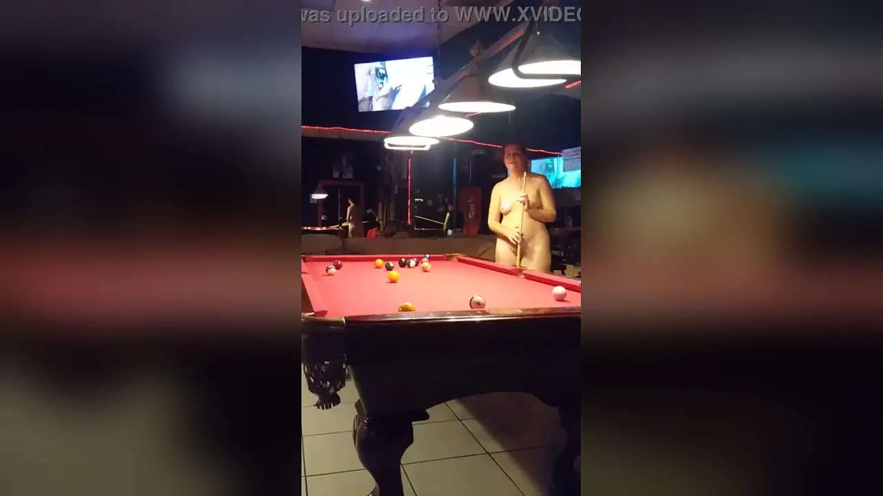 Chubby MILF strips naked and plays pool in high heels