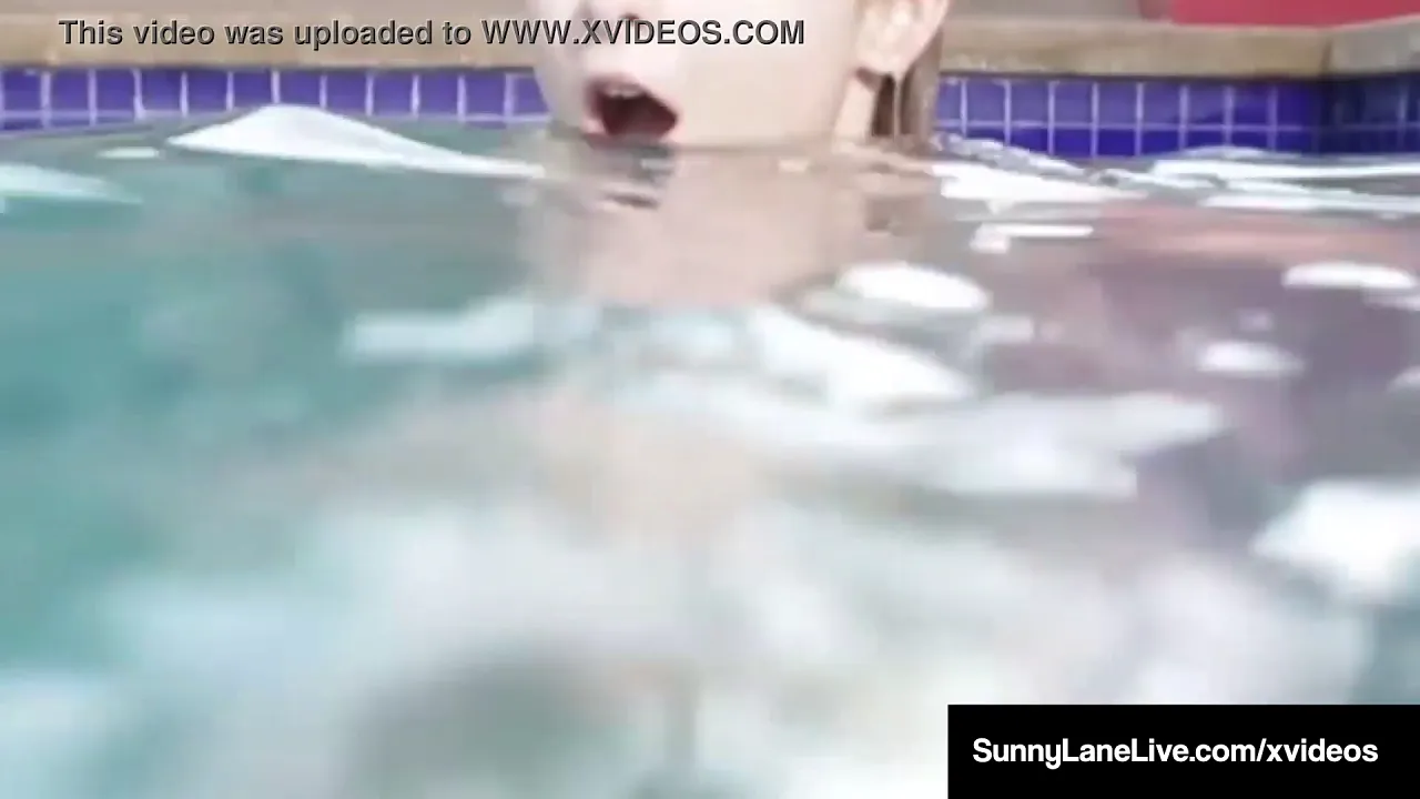 Blonde pornstar Sunny Lane sucks and jerks off a guy underwater in the pool