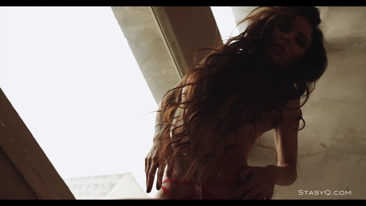 Babe poses erotically for the camera