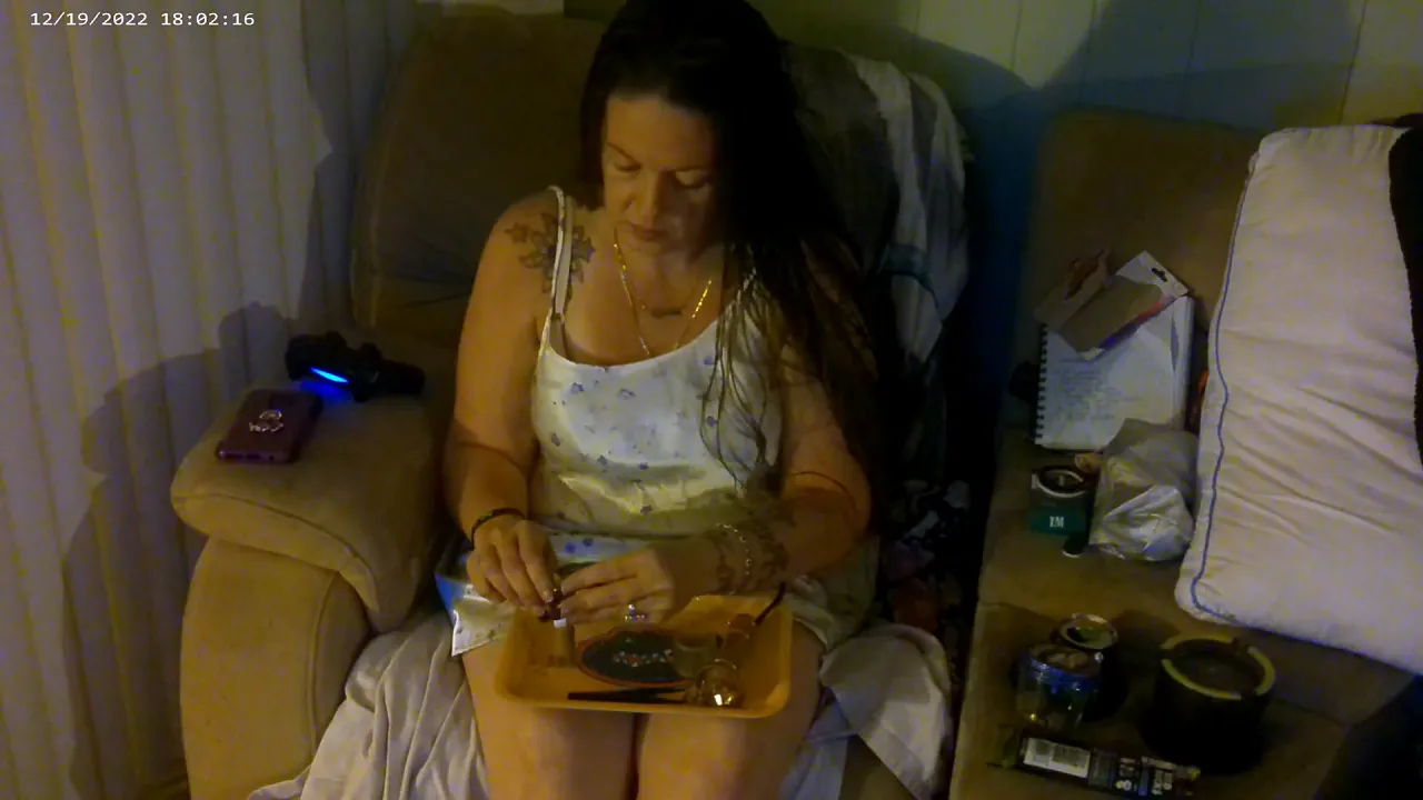 BBW MILF in pink lingerie smokes while playing video games