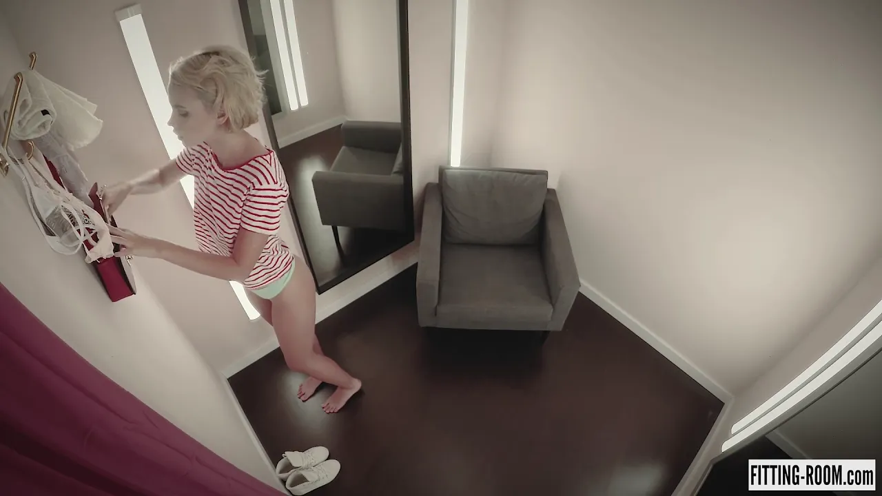 Blonde Ariel masturbates with a toy in a lingerie shop