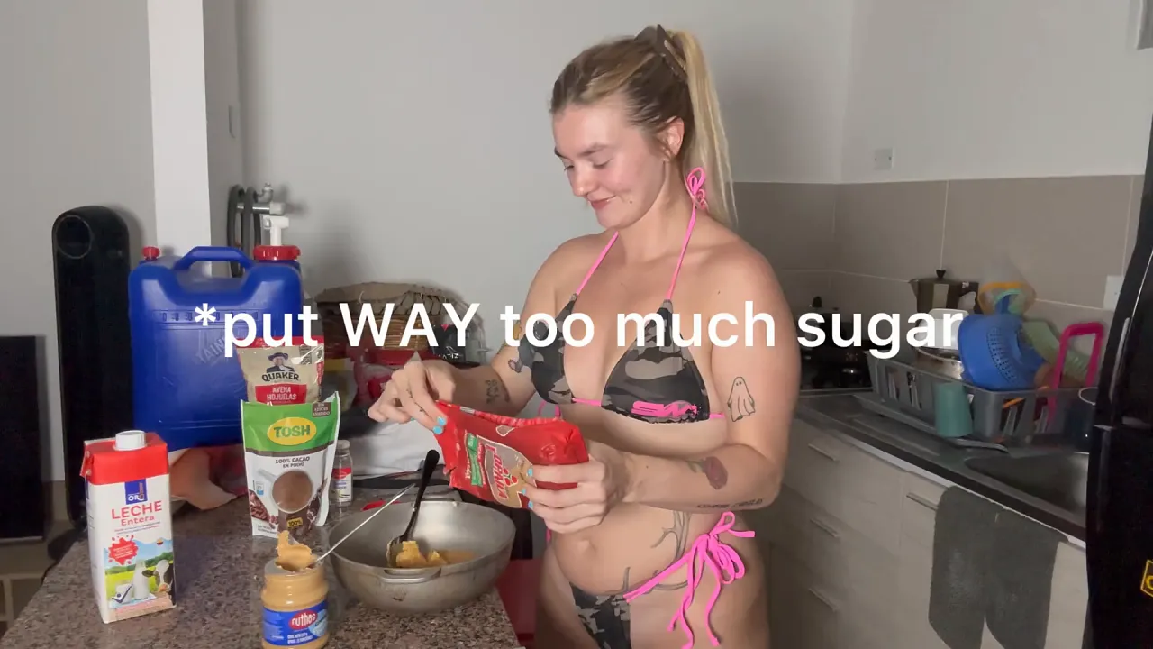 Emily Rose TV bakes cookies while wearing a cute bikini