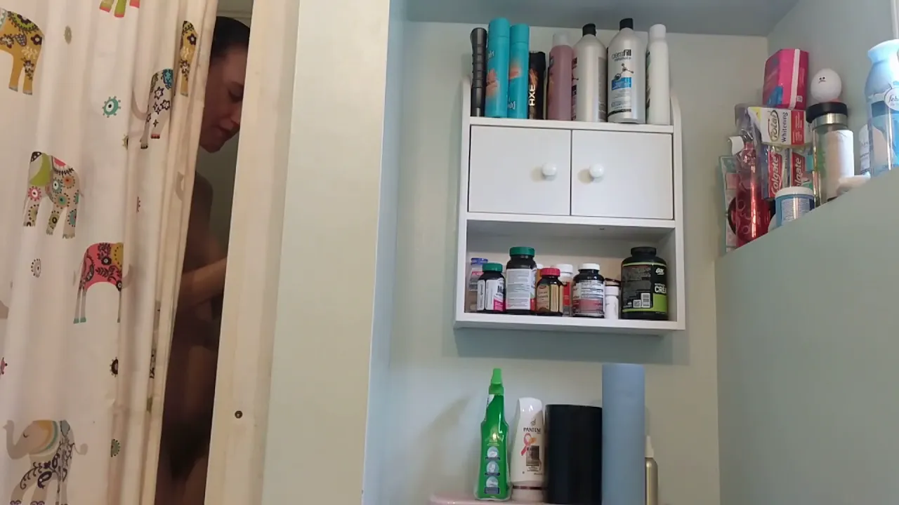 Perverted stepbrother watches his stepsister shave her bush in the shower