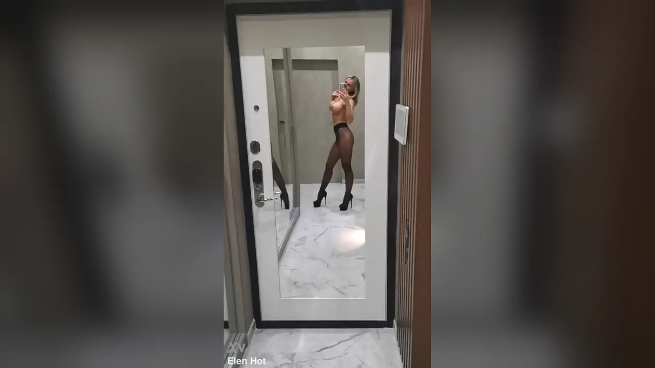 Blonde amateur with big tits and hard nipples in sheer pantyhose