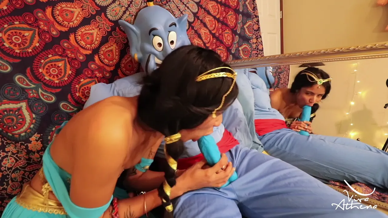 Viva Athena cosplays as Princess Jasmine and masturbates with a toy while sucking the
