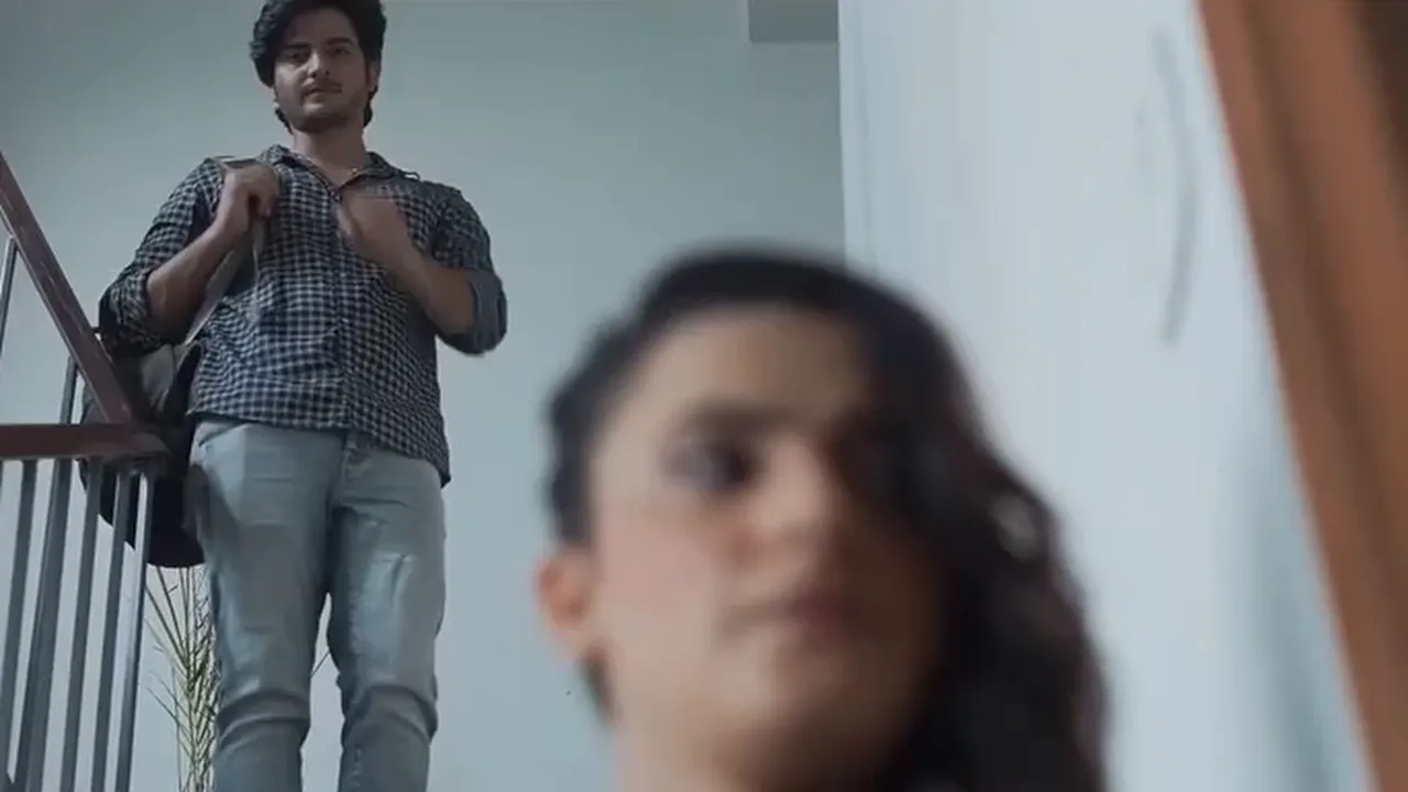 Ayesha Kapoor kisses a man in an Indian movie scene