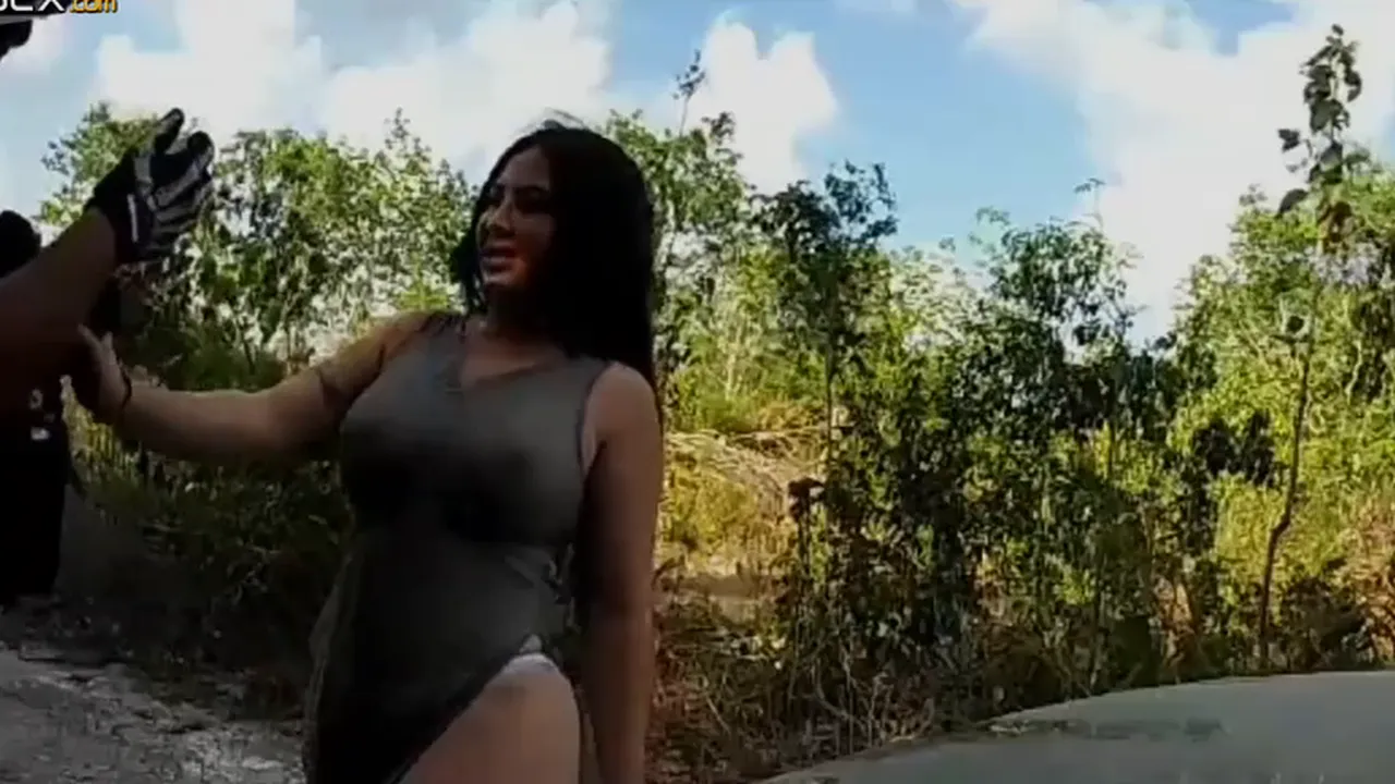 Curvy Latina MILF in transparent dress flirts with cop, lets him feel her big boobs and
