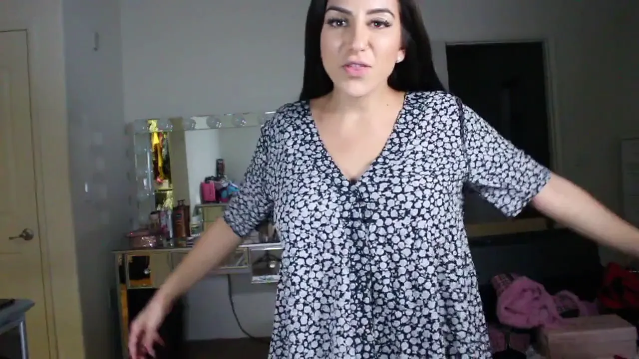Armenian babe Lena The Plug strips down to show off her big tits in sexy outfits