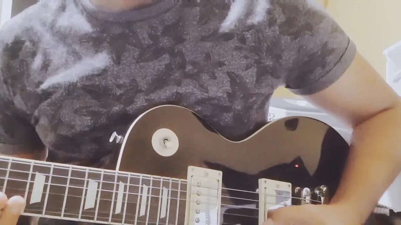 Solo woman plays Queen's Bohemian Rhapsody while fingering herself