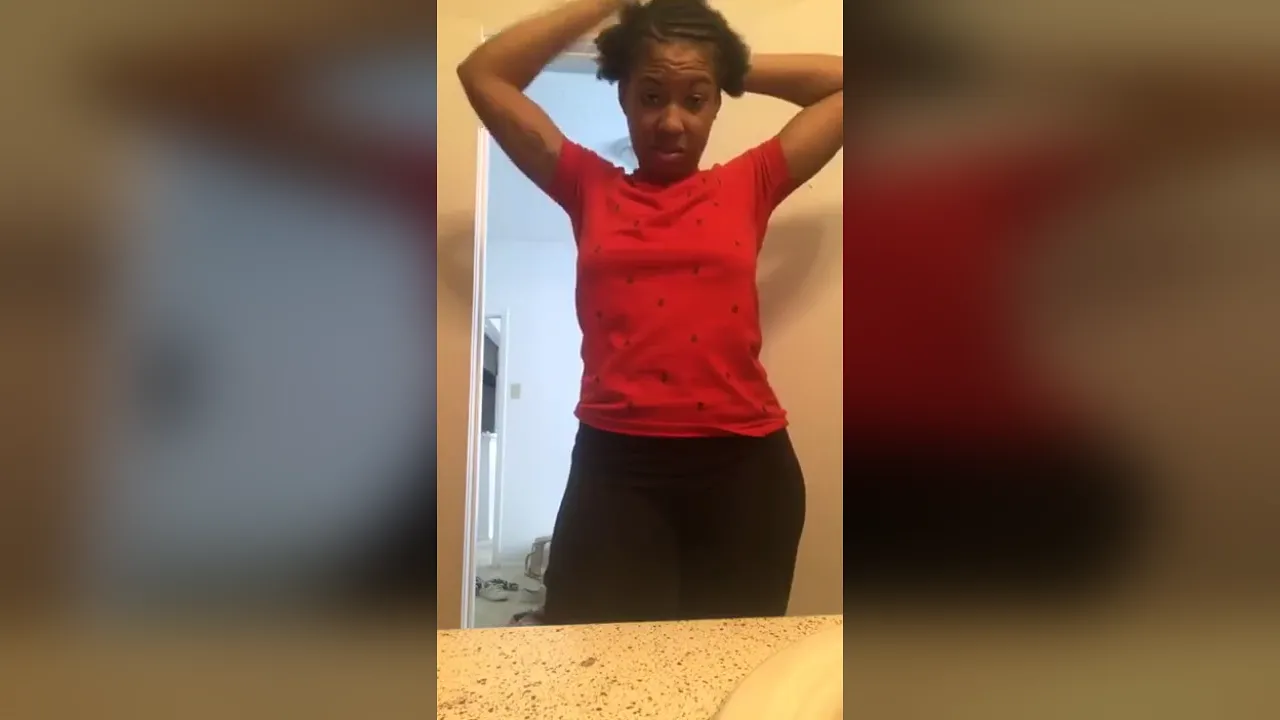 Perky ebony solo girl twerks and shows her bouncing bubble butt in front of a mirror
