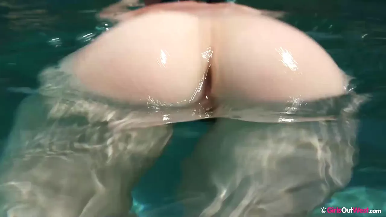Amateur white girl with hairy pussy swims in the pool