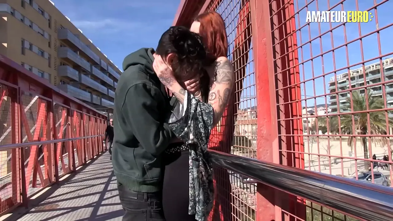 Tattooed redhead Silvia Rubi flashes her pierced tits outdoors while he grabs her ass