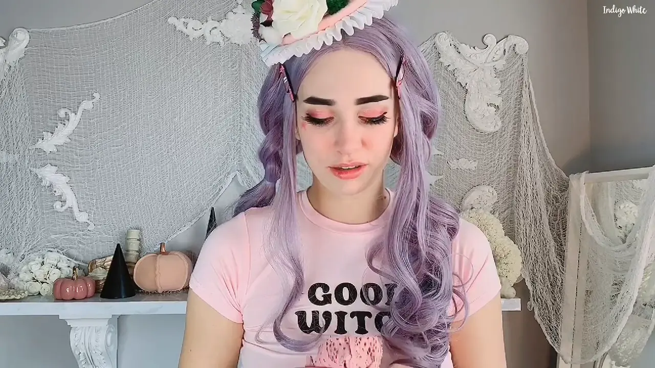 Indigo White cosplays as a cute witch for solo masturbation