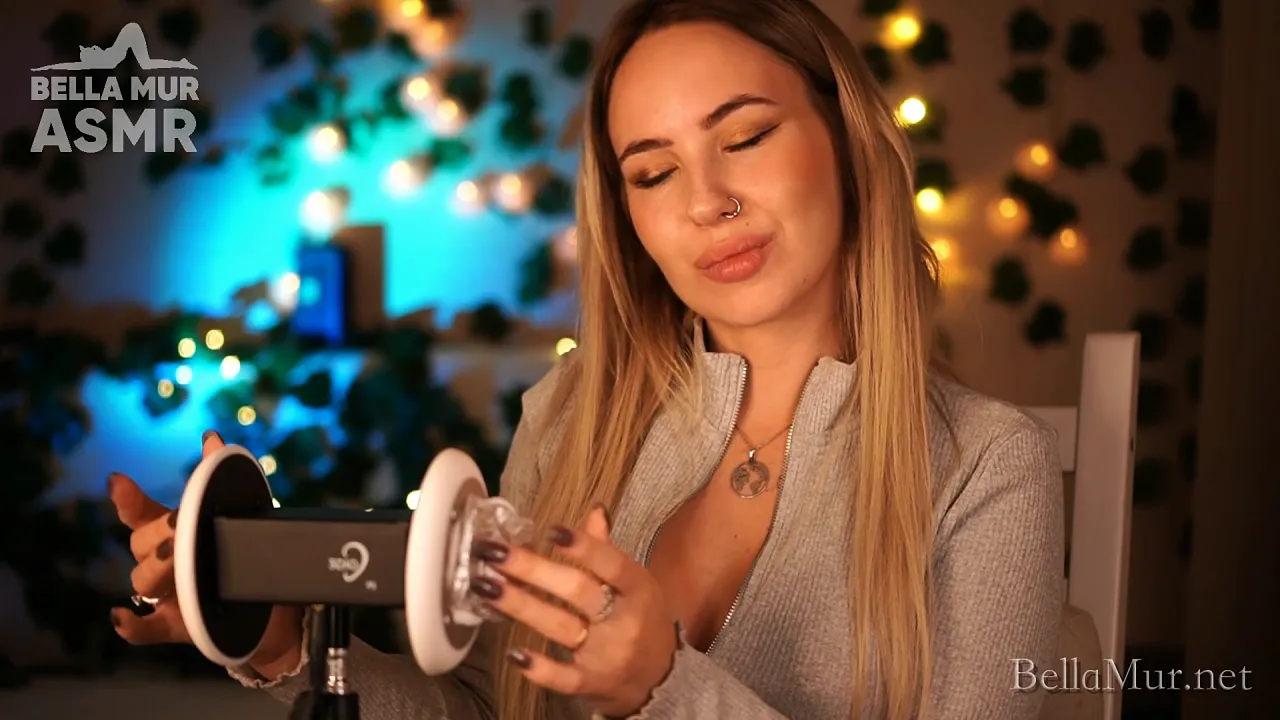 Clothed solo girl ASMR sounds from playing with a condom