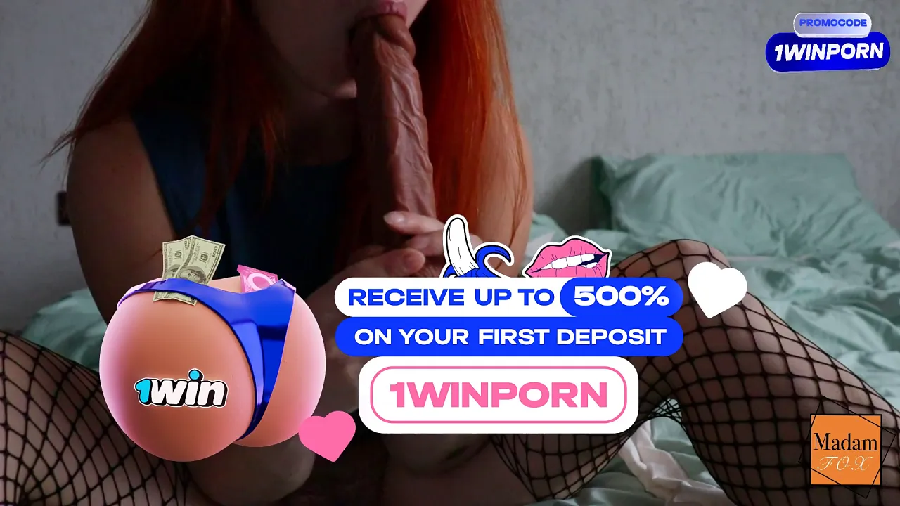 Solo Russian redhead Madam Fox masturbates with a big dildo while wearing fishnet