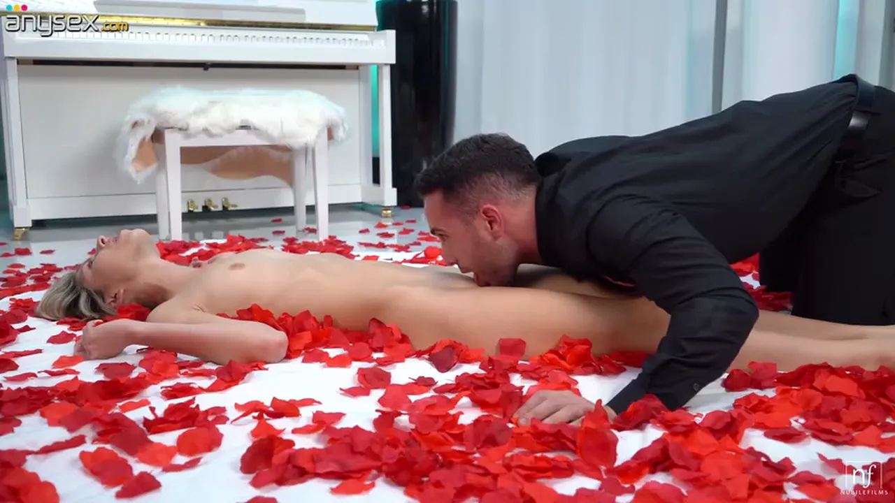 Blonde Gina G enjoys romantic sex on the floor with Raul Costa among roses