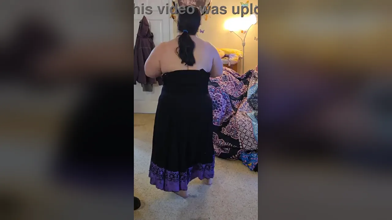 BBW Sydney592173 strips and dances seductively in a black dress