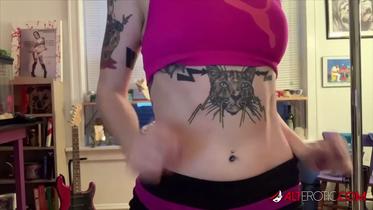 Inked brunette Vex Voltage masturbates with a toy during quarantine