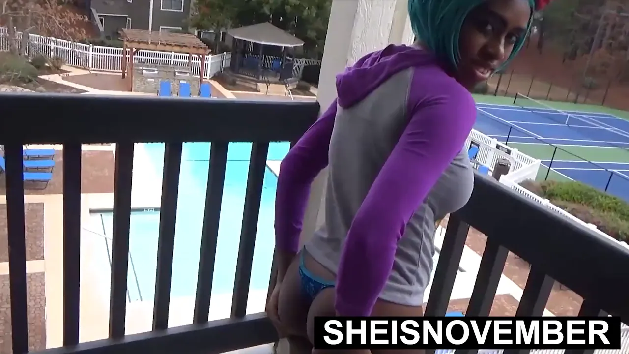 Sheisnovember winks while exposing her young black pussy and anus, then pulls down her