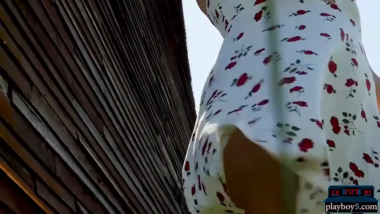 Tight blonde models striptease and pose outdoors