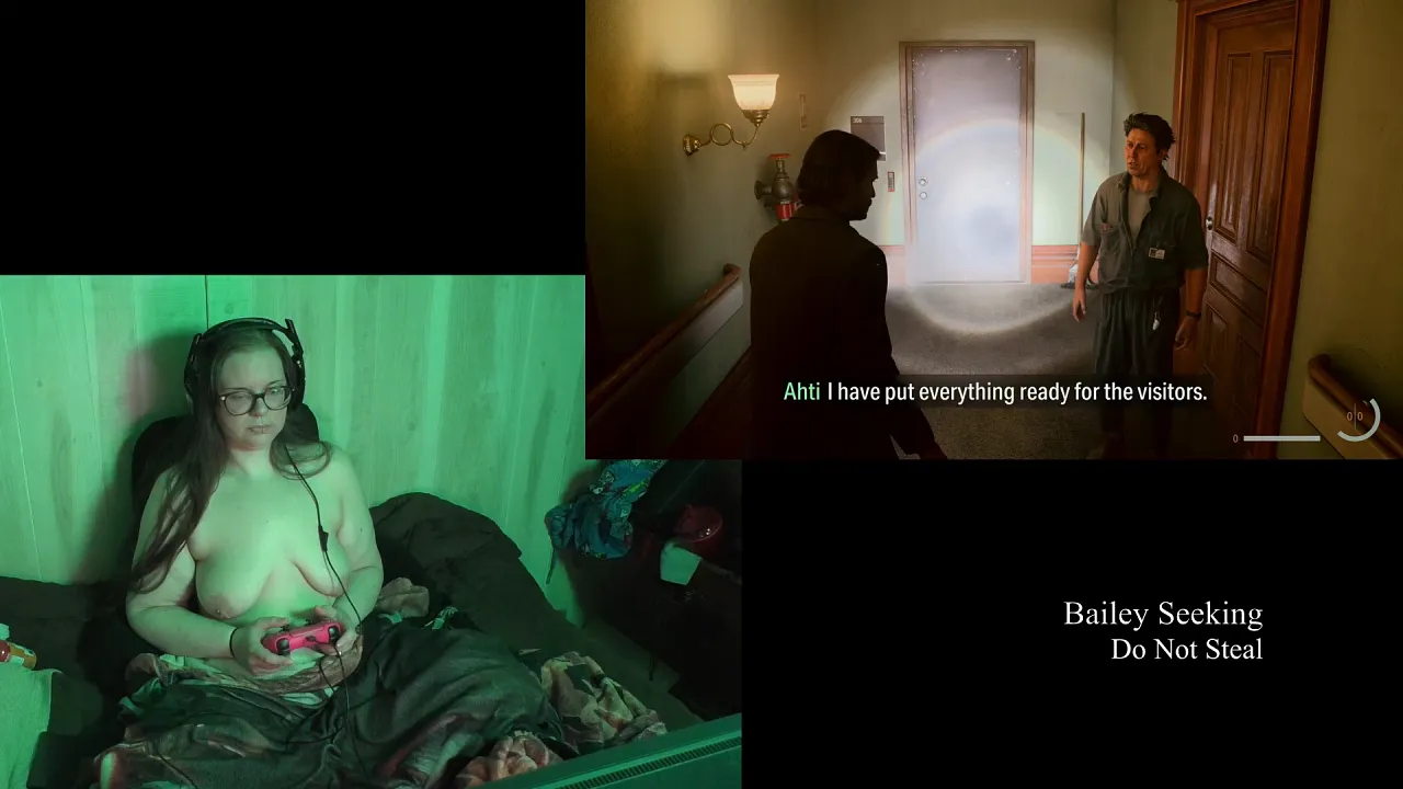 BBW Bailey Seeking plays video games naked with big natural tits, tattoos and long hair