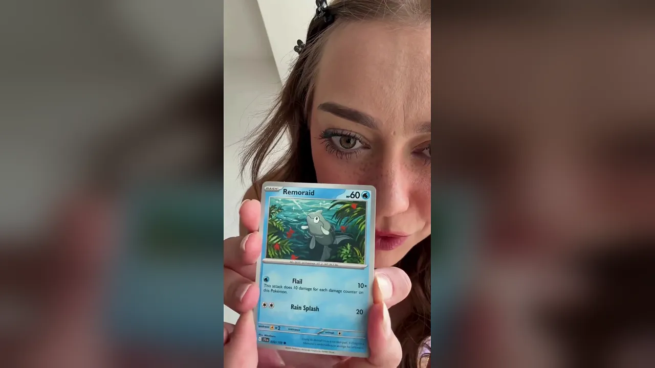 Brunette babe SpideyAva shows off her hairy pussy in lingerie while playing Pokemon card