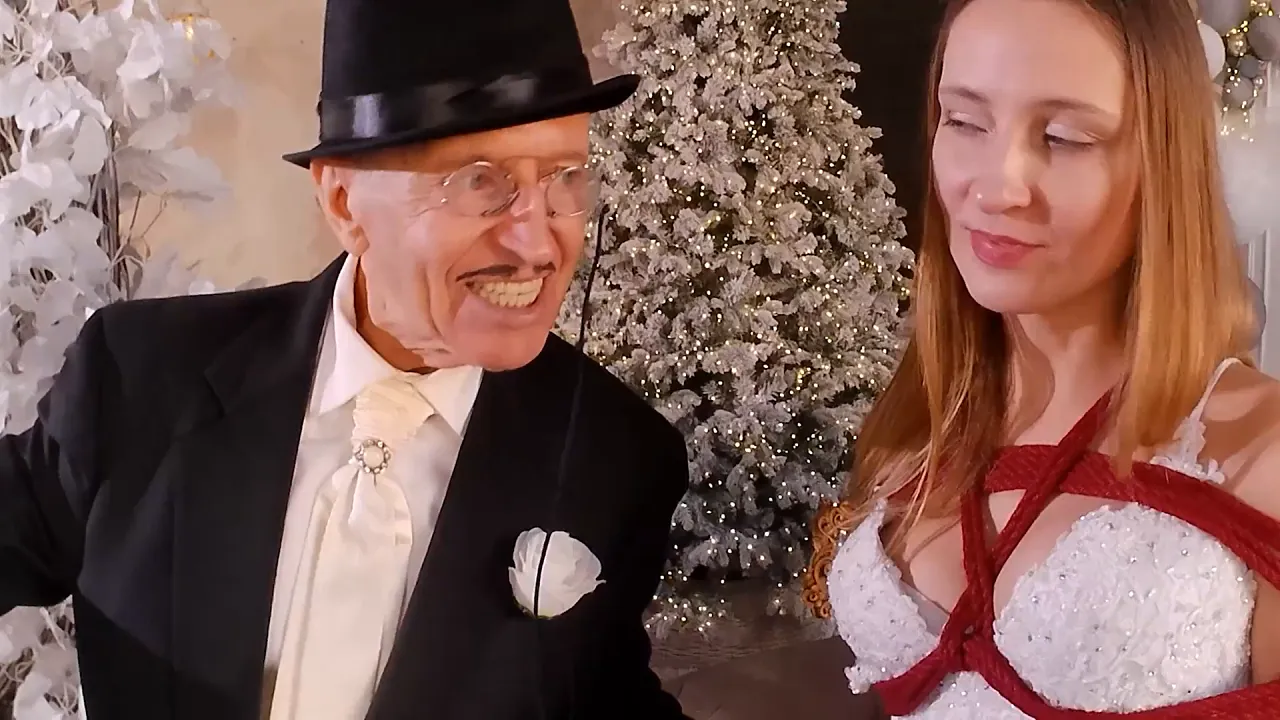 Clothed man with naked amateur women in fetish bondage bride roleplay