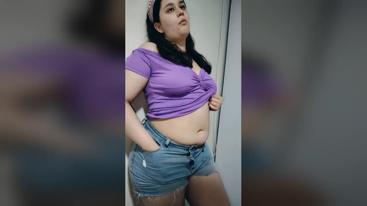 BBW Nicole slowly teases her chubby body before stuffing her stomach