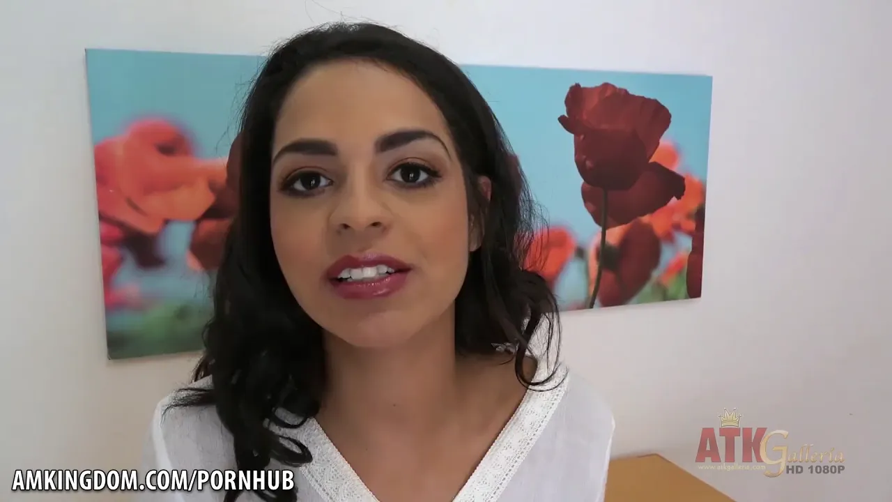 Brunette Latina Vienna Black strips and teases in interview