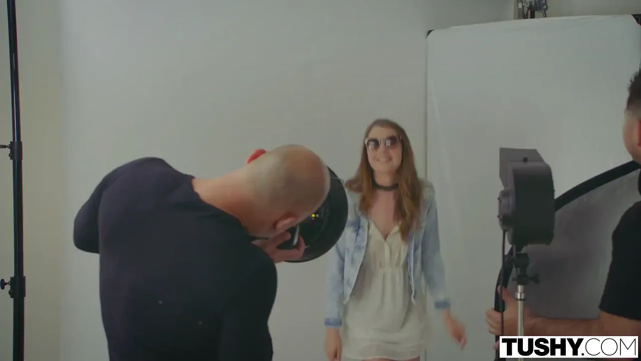 Slender Elena Koshka gets fucked hard in both holes by her photographer after cunnilingus
