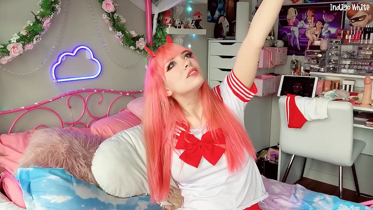 Indigo White cosplays Zero Two and masturbates with a toy while being filmed in POV