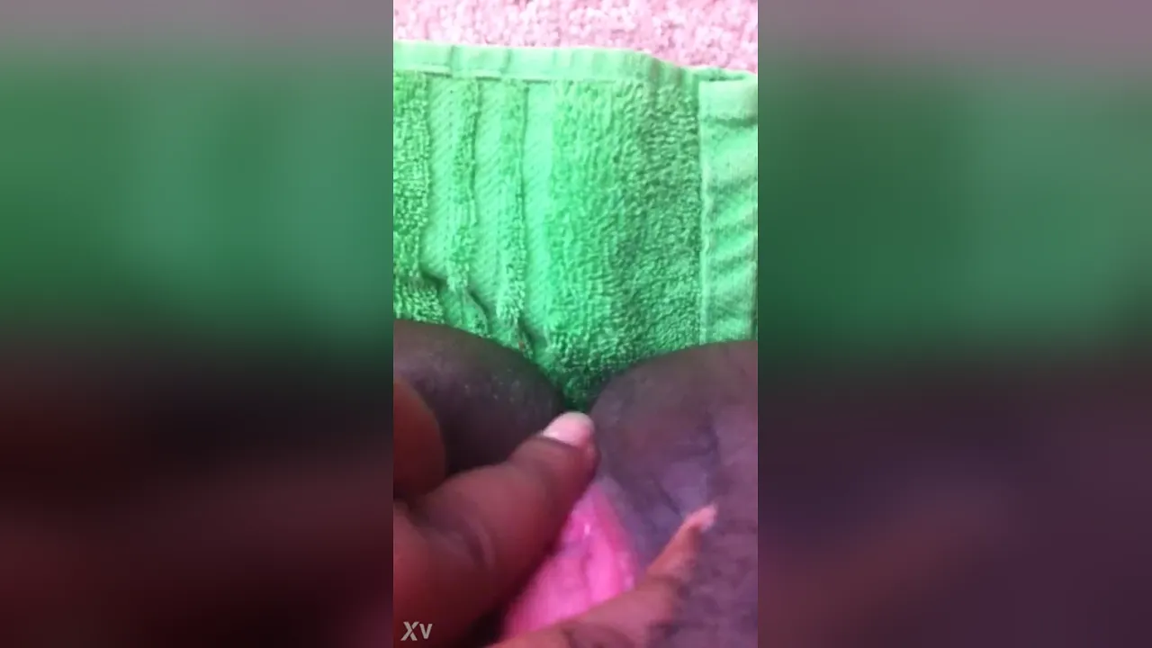 Black girl plays with her big, hairy pink pussy