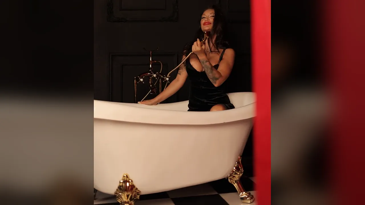 Russian MILF Monika Fox poses in a black dress and takes off her clothes in the bath
