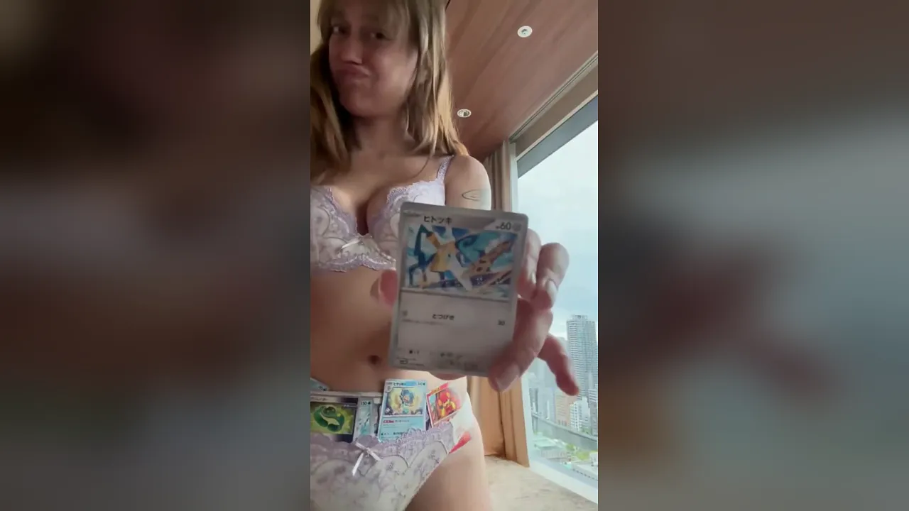 Brunette babe SpideyAva shows off her bush in lingerie while ripping Pokemon cards