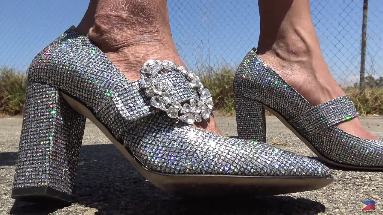 Viva Athena shows off her new high heels on the street