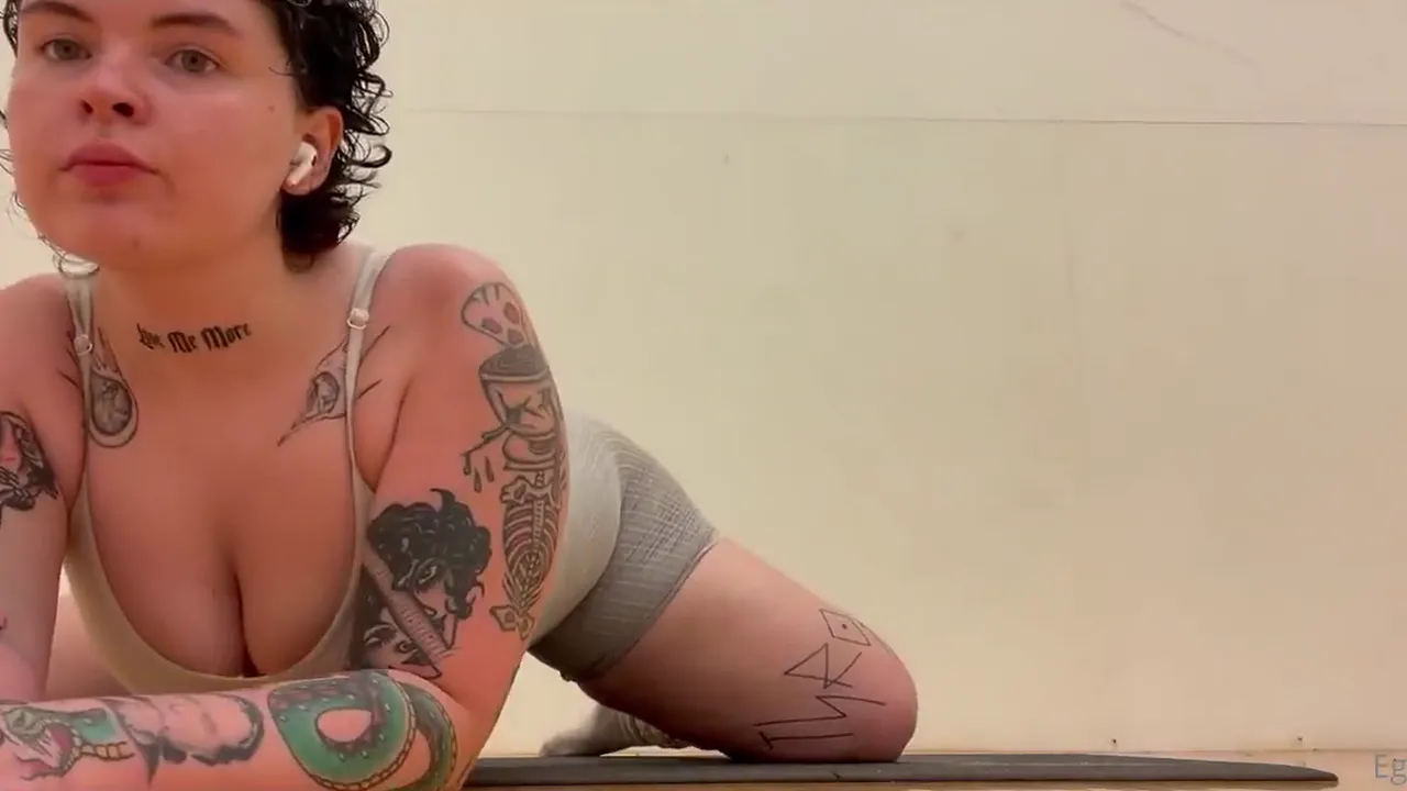 Inked BBW solo stretching and showing off her big ass and tits