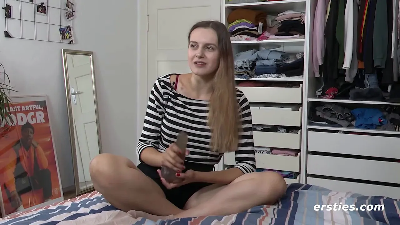 Beautiful blonde German babe masturbates with a dildo in soft close-up