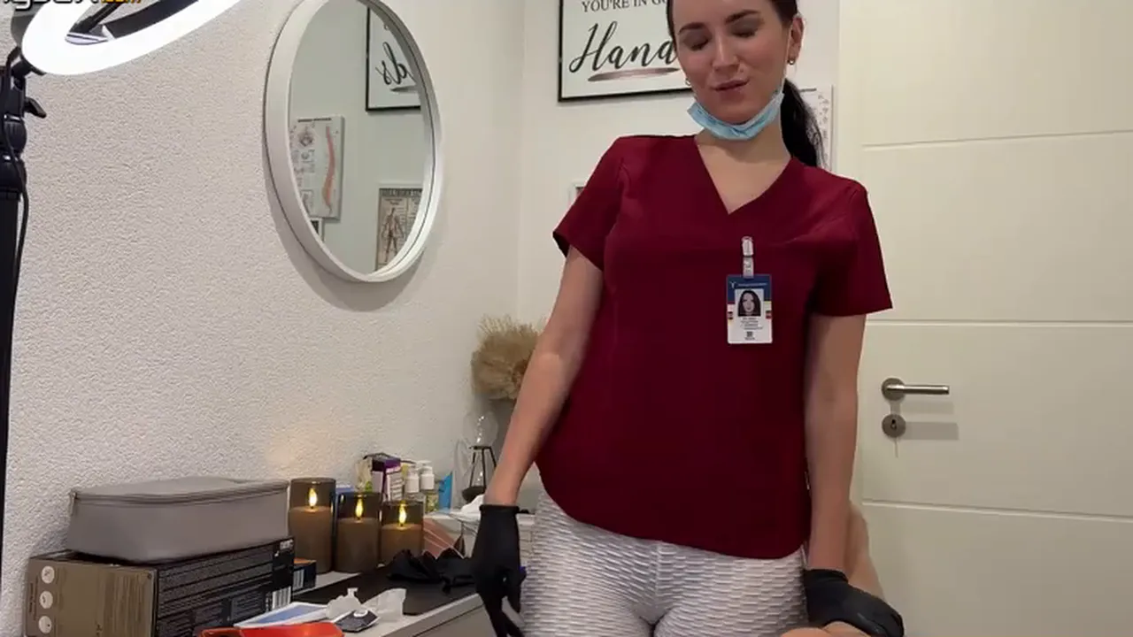 Russian MILF gives her client a nice blowjob and handjob after lasering his balls in the