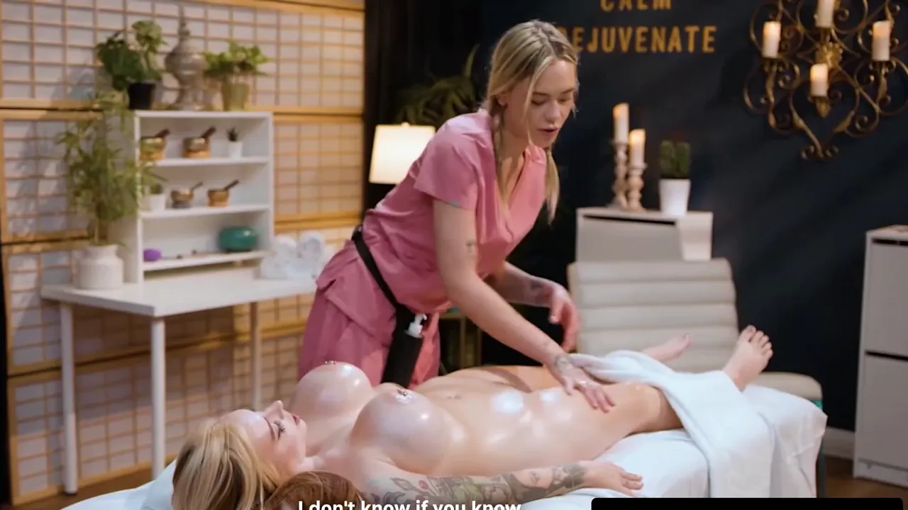 Blonde masseuse and client trade massages into lesbian sex on the couch