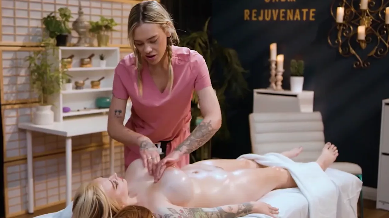 Blonde massage therapist gets aroused and has lesbian sex with client