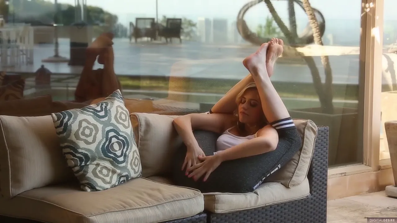 Mia Malkova poses and masturbates solo on the couch