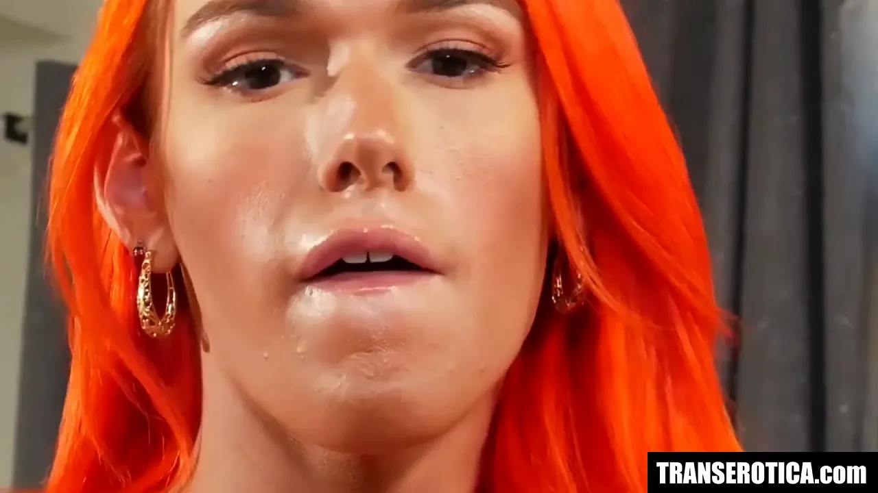 Trans redhead with big tits masturbates and wanks herself in fishnets