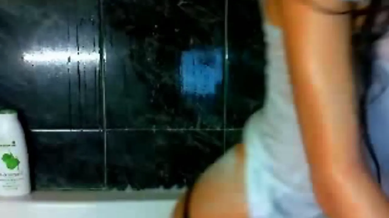 Beautiful webcam model strips naked and takes a sexy shower